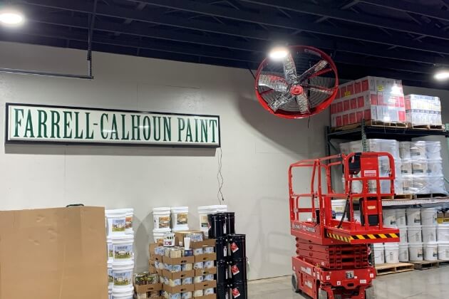 AirFocus high velocity heavy duty fan hanging in paint warehouse ceiling